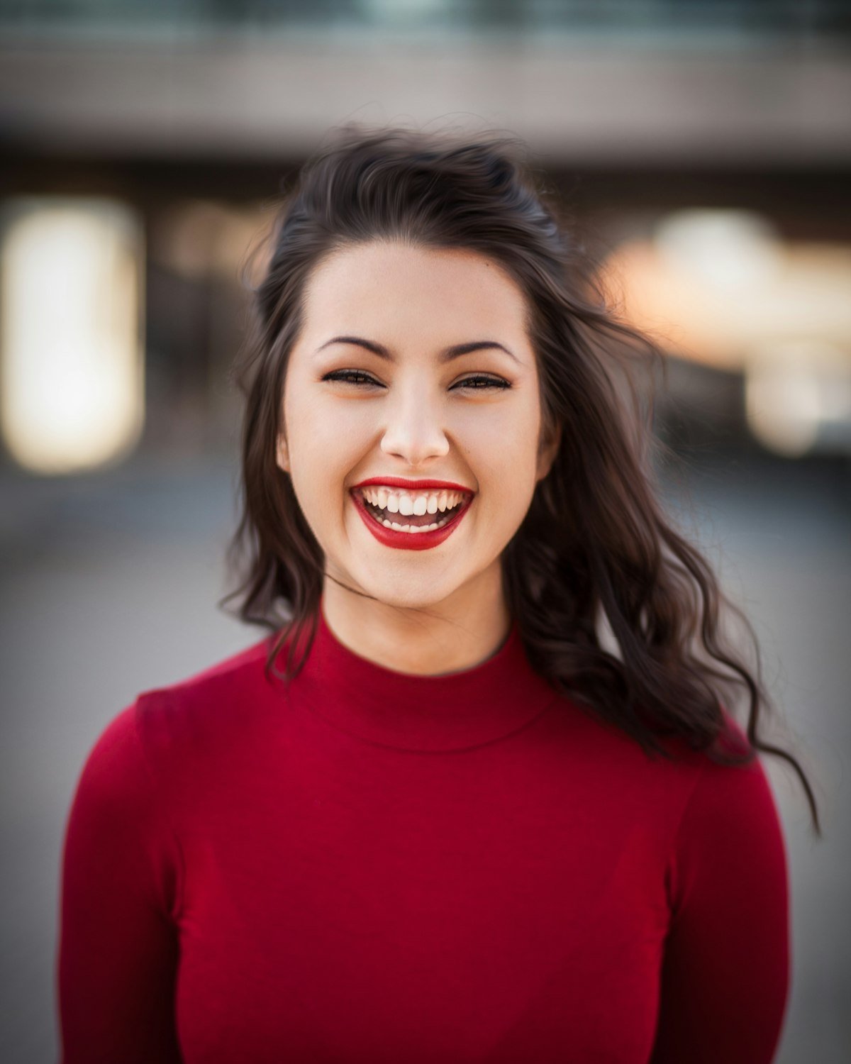 Smiling woman in a red top